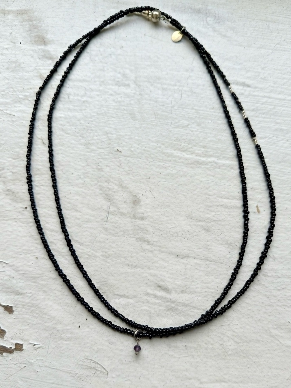 Delicate Black Beaded Double-Strand Necklace with Gold Filled Purple Charm